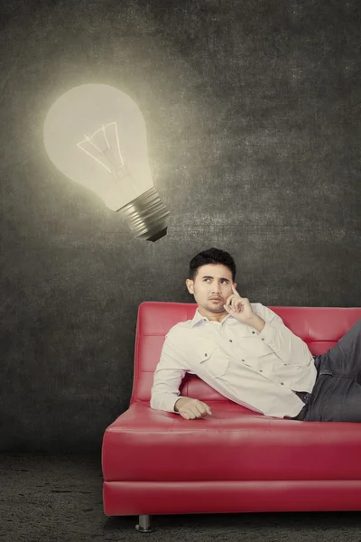 Asian person having bright idea — Stock Photo, Image