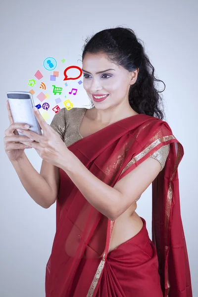 Indian woman with social media icon — Stock Photo, Image