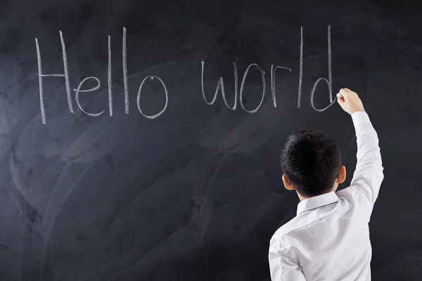 Boy writes text Hello World — Stock Photo, Image