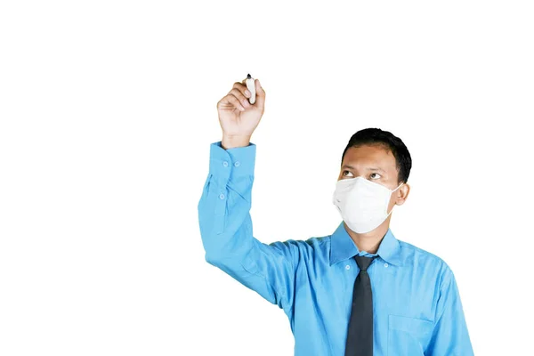 Male Entrepreneur Wearing Mask While Writing Transparent Screen Isolated White — Stock Photo, Image