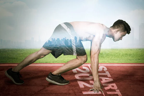 Double Exposure Young Man Kneeling Start Line Number 2021 While — Stok Foto