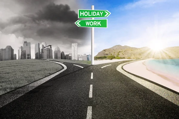 Image of empty road with two opposite arrows on the signpost to holiday or work