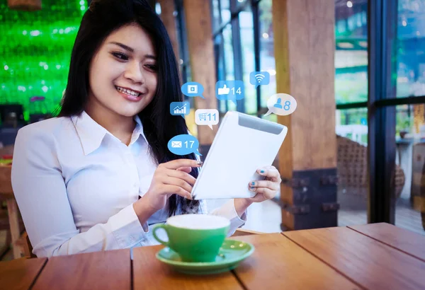 Young Woman Using Social Media Network Digital Tablet Notification Icons — Stock Photo, Image