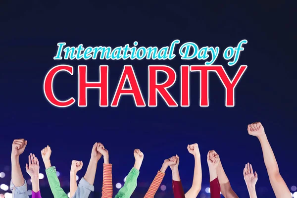 Grupo Personas Levantadas Mano Con Día Internacional Caridad —  Fotos de Stock