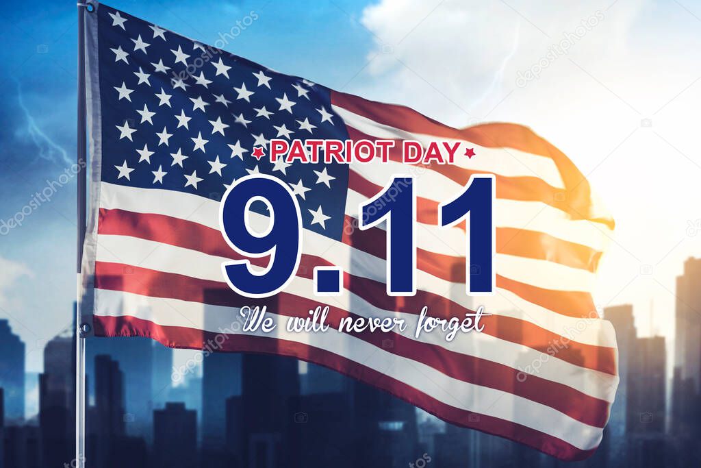 Close up of Patriot day text with American flag with twin towers under blue sky background