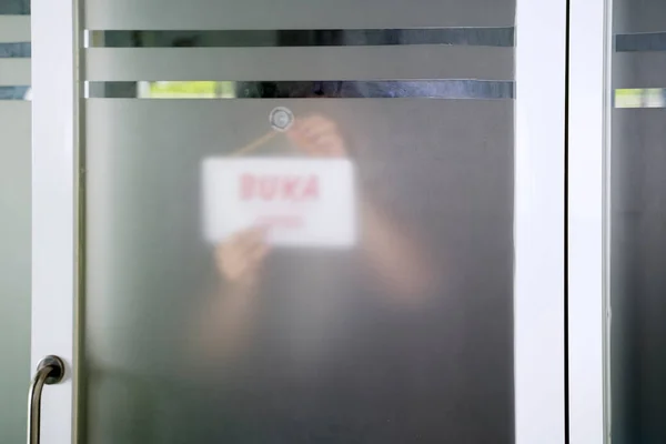 Young Businesswoman Putting Store Sign Open Word Storefront While Reopening — Fotografia de Stock