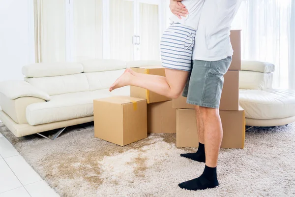 Close Happy Young Man Lifting His Wife While Moving New — Φωτογραφία Αρχείου
