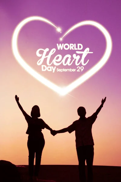 Silhouette Young Couple Holding Hands Together While Standing World Heart — Foto Stock