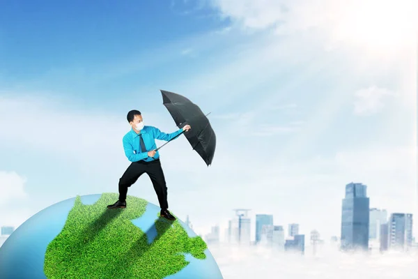 Young Businessman Umbrella Protect Planet Earth Ozone Depletion Effects While — Fotografia de Stock