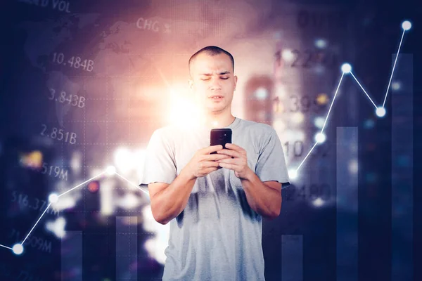 Young Man Looks Confused While Using Cellphone Standing Growth Finance — Stock fotografie