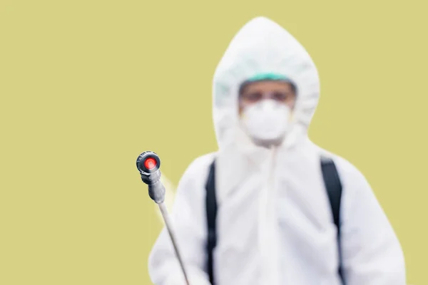 Male Worker Wearing Protective Suit While Using Disinfectant Spray Prevent — Stockfoto