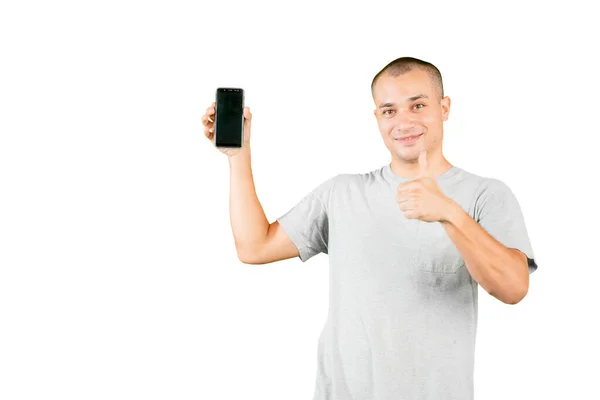 Caucasian Man Showing Thumb While Holding Mobile Phone Blank Screen — Foto Stock
