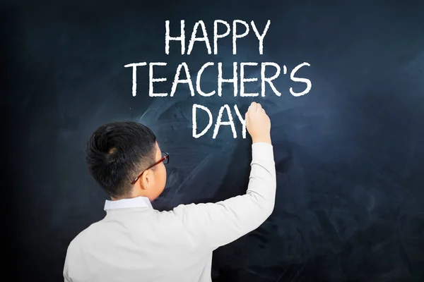 Rear View Schoolboy Writing Text Happy Teacher Day Blackboard While — Stock Photo, Image