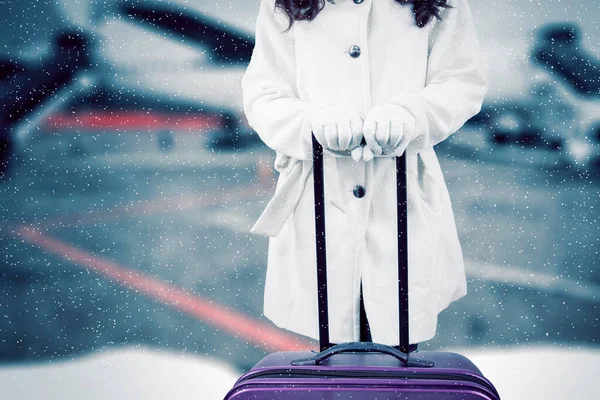 Close Young Woman Hands Holding Luggage While Standing Snowfall Airport — Stock Photo, Image