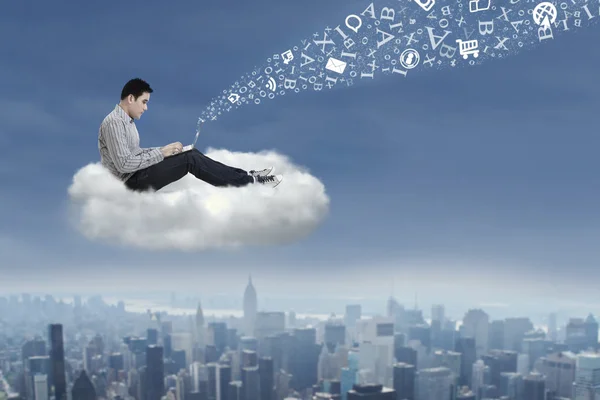 Asian man working on a cloud 1 — Stock Photo, Image