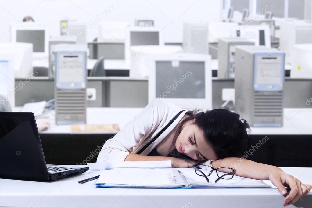 Businesswoman Sleeps In Office