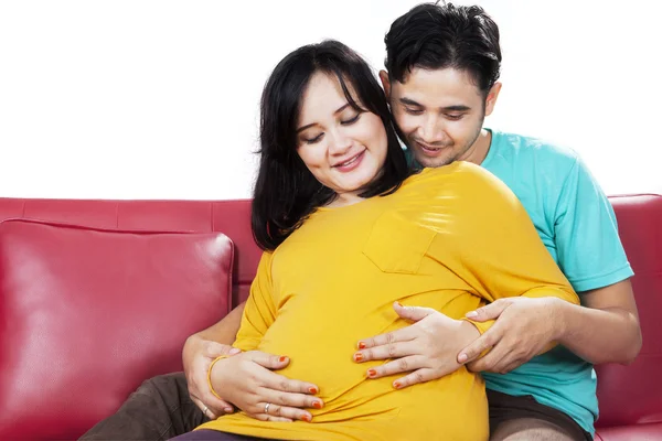 Father and mother touching tummy — Stock Photo, Image