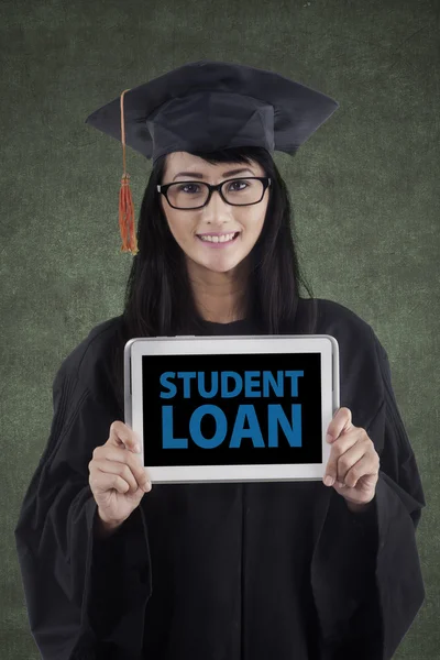 Bachelor showing a student loan text — Stock Photo, Image