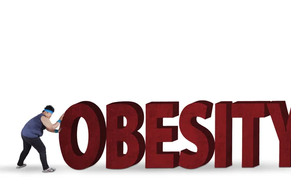 Man with an obesity word — Stock Photo, Image