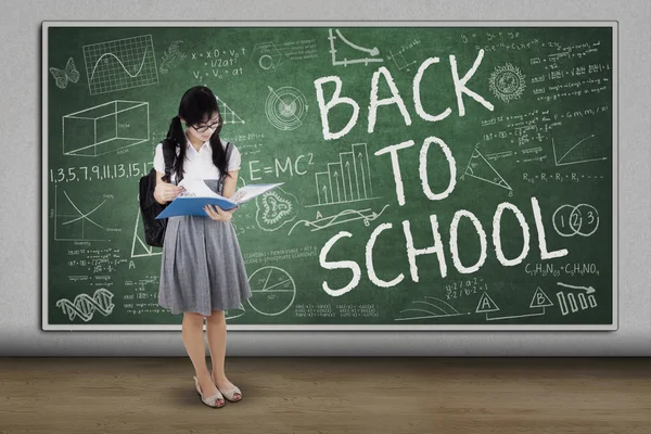 Smart student standing in class — Stock Photo, Image