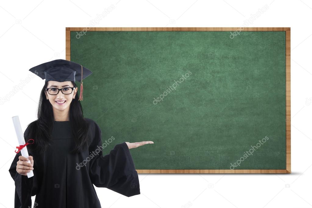 Young graduate showing empty board 1