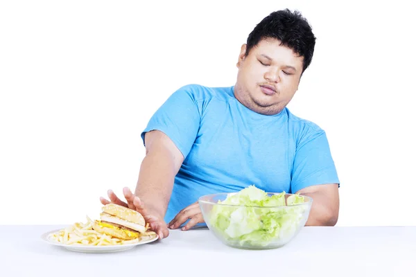 Fat man refuse junk food 1 — Stock Photo, Image