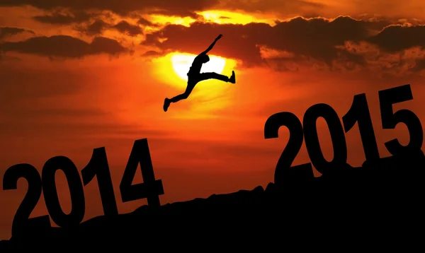 Person jumping over 2015 — Stock Photo, Image