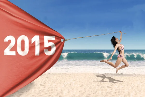 Güzel bir kız bikini ile banner yeni yıl — Stockfoto