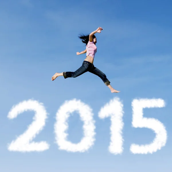 Woman jumping on the sky — Stock Photo, Image