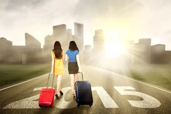 Two women walking to the future — Stock Photo, Image