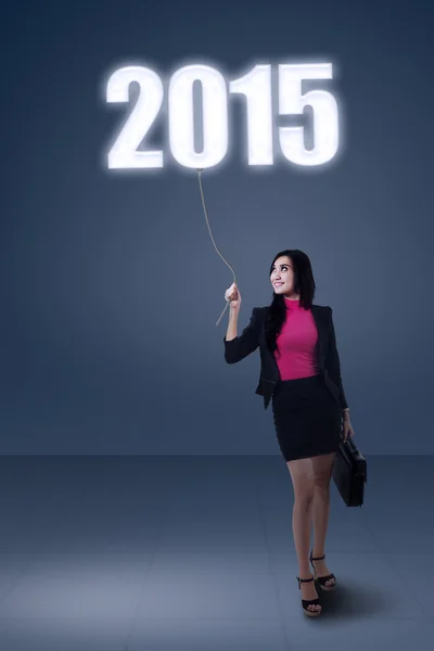 Vrouwelijke werknemer en nummer 2015 — Stockfoto