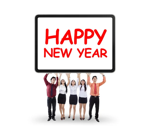 Businesspeople holding new year text — Stock Photo, Image