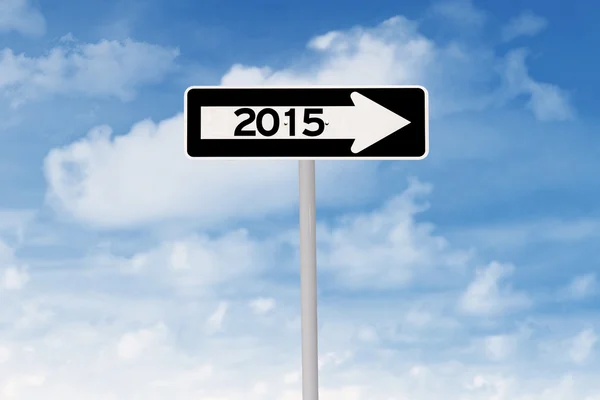 Road sign with route to 2015 — Stock Photo, Image