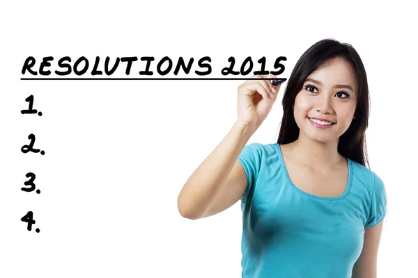 Woman make a list of her resolutions — Stock Photo, Image