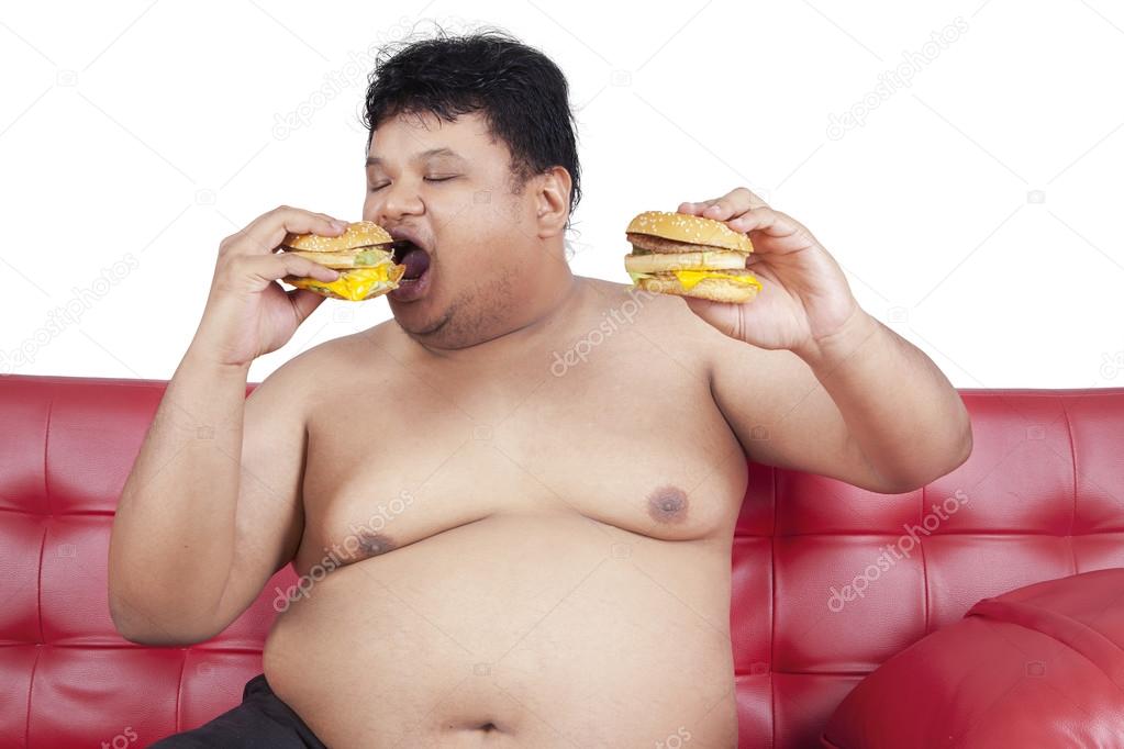 Greedy fat man eating hamburger 2