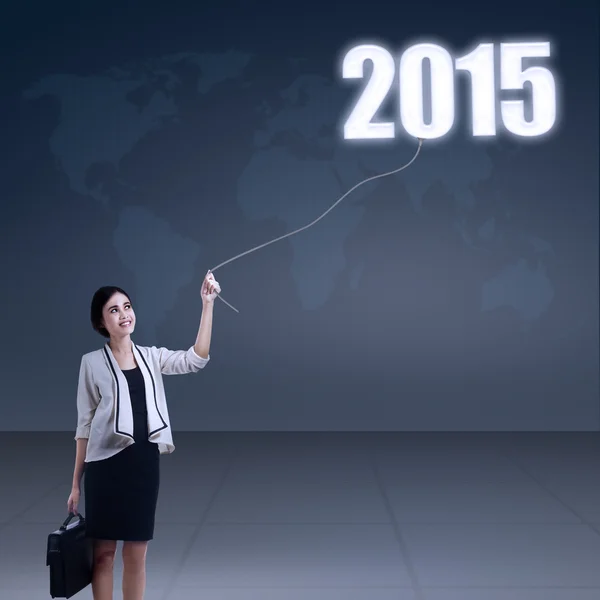 Number 2015 and asian businesswoman — Stock Photo, Image
