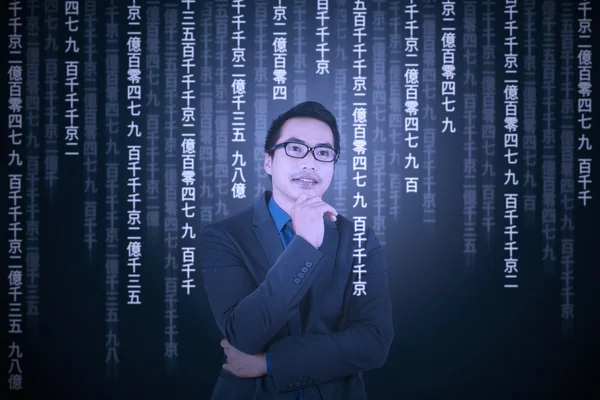 Thoughtful man translating information — Stock Photo, Image