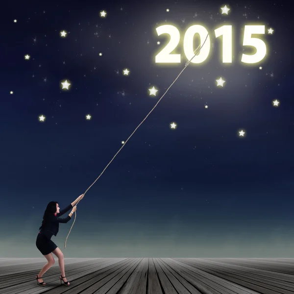 Woman taking number of 2015 — Stock Photo, Image