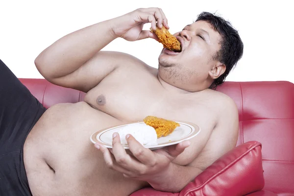 Fat man eats fast food 2 — Stock Photo, Image
