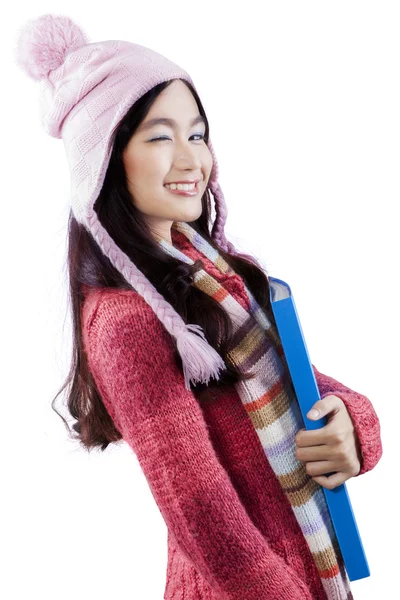 Cute schoolgirl wink at the camera — Stock Photo, Image