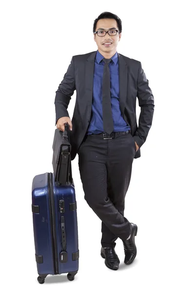 Businessman in formal suit with luggage — Stock Photo, Image