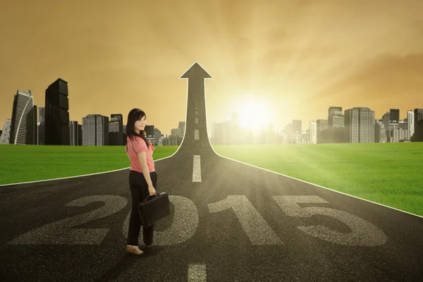 Lovely businesswoman on the highway — Stock Photo, Image