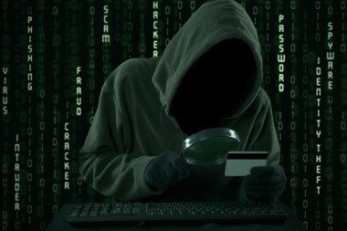Hacker looking for credit card code clipart