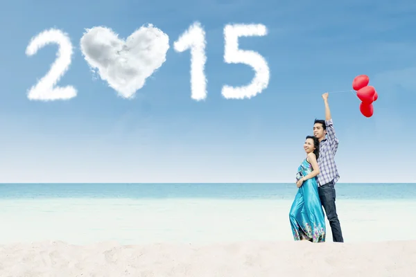 Newlywed couple honeymoon in new year — Stock Photo, Image