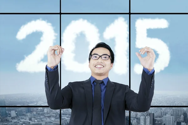 Entrepreneur expressing happy with numbers 2015 — Stock Photo, Image