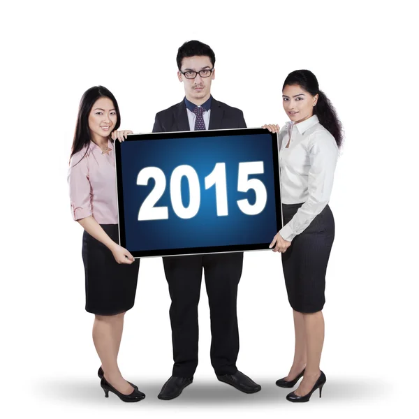 Empresarios multiétnicos con números 2015 — Foto de Stock