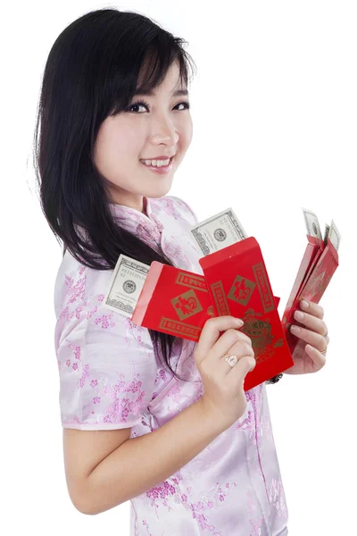 Teenage girl with money dollars cash in envelope — Stock Photo, Image