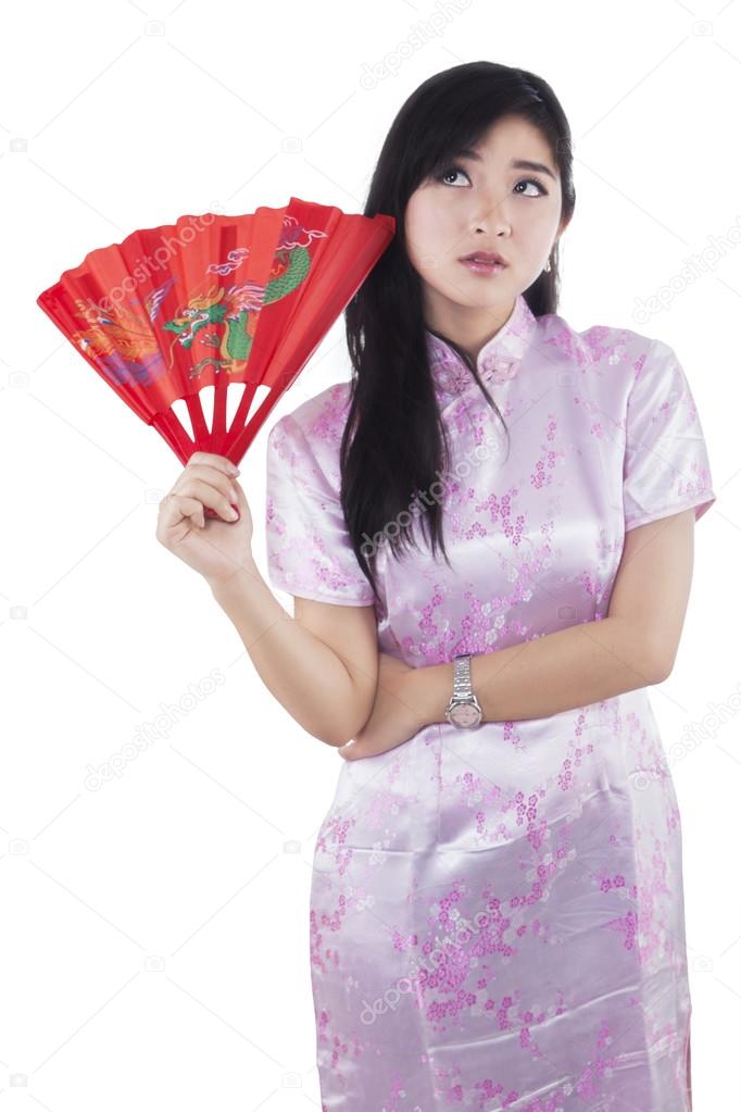 Teenage girl wearing a cheongsam