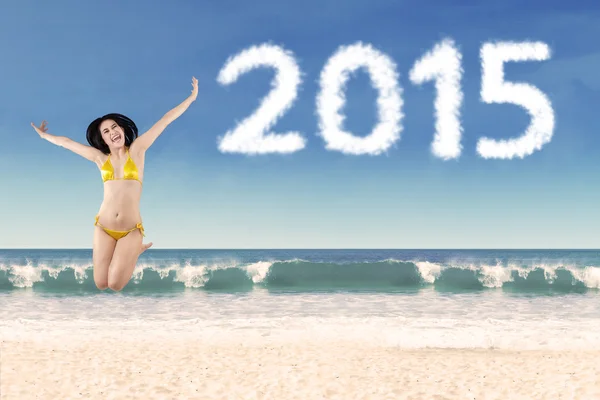 Girl wearing swimsuit in new year holiday — Stock Photo, Image