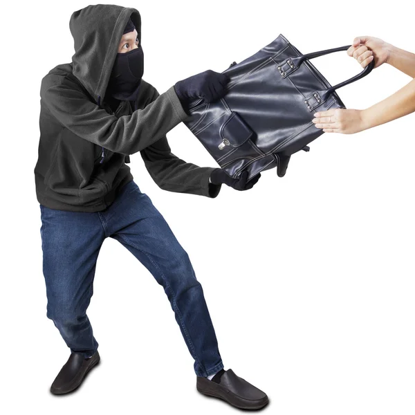 Pickpocket agarrando bolsa de uma mulher — Fotografia de Stock